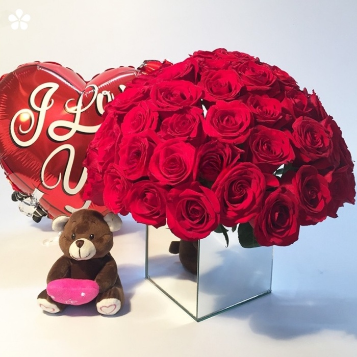 Cubo de espejo lleno de rosas más osito