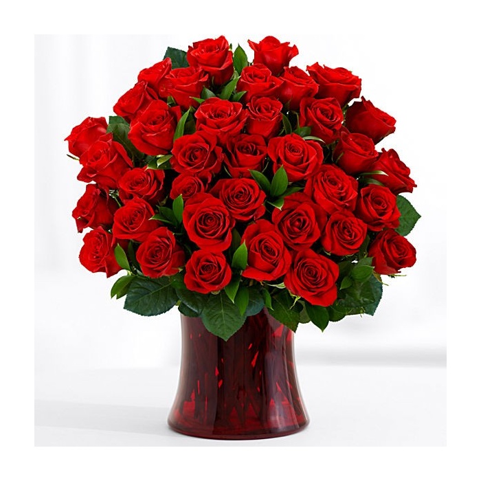 100 Rosas premium en florero de vidrio rojo